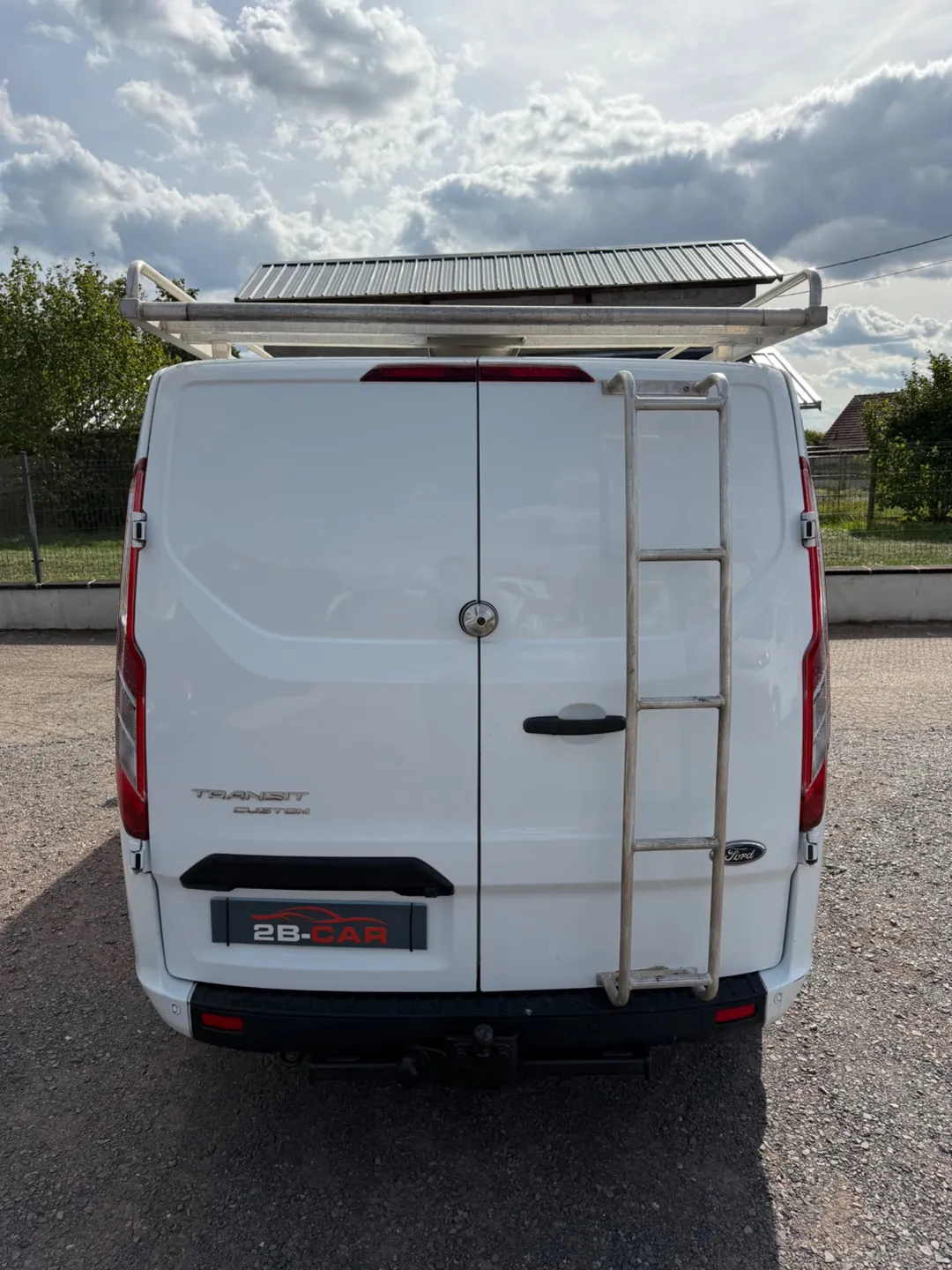 Ford Transit Custom Fourgon L2H1 2.0 TDCI 130cv BVM6 / Galerie Aluminium / Crochet d’attelage mixte / Habillage bois / Caméra de recul / CarPlay - Photo 14